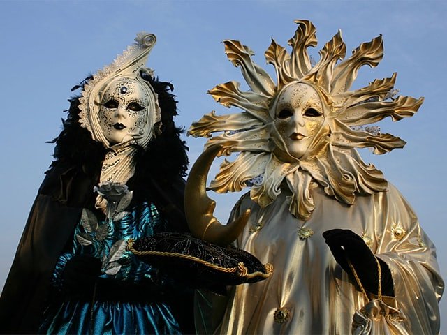 Masked participants celebrating Carnival in Venice. Photo by Pascal Riben