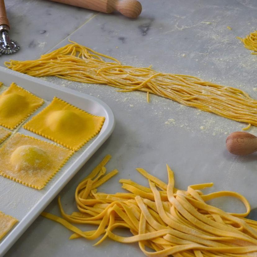 Fresh pasta preparation during a private tailor made cooking class in Rome