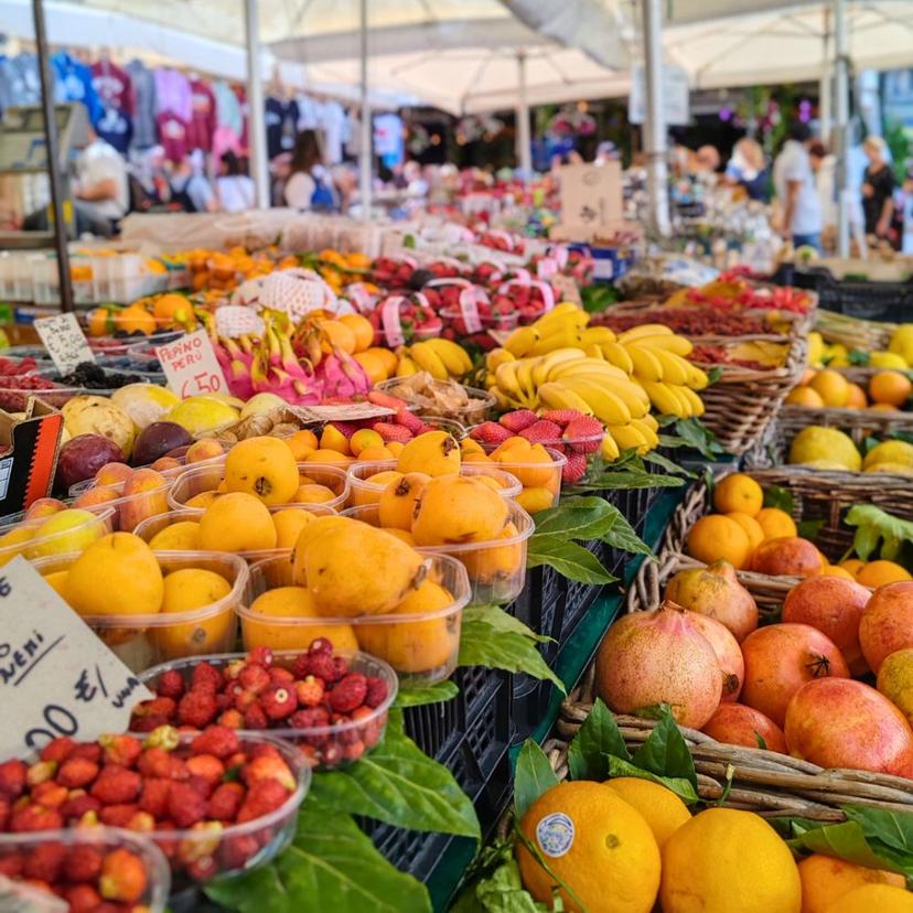 Fresh fruit at Roman market for Italian Sunday Lunch class Variety of fresh fruit displayed at a Roman farmers market Campo de Fiori for the Farmers Market hopping with roman full course at InRome Cooking