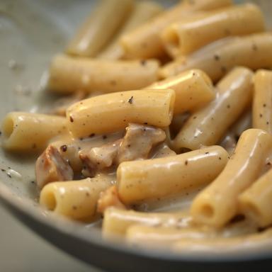 pasta-alla-gricia-traditional-roman-pasta-dish-ready-to-serve Authentic pasta alla Gricia served in Rome with Pecorino Romano and crispy guanciale