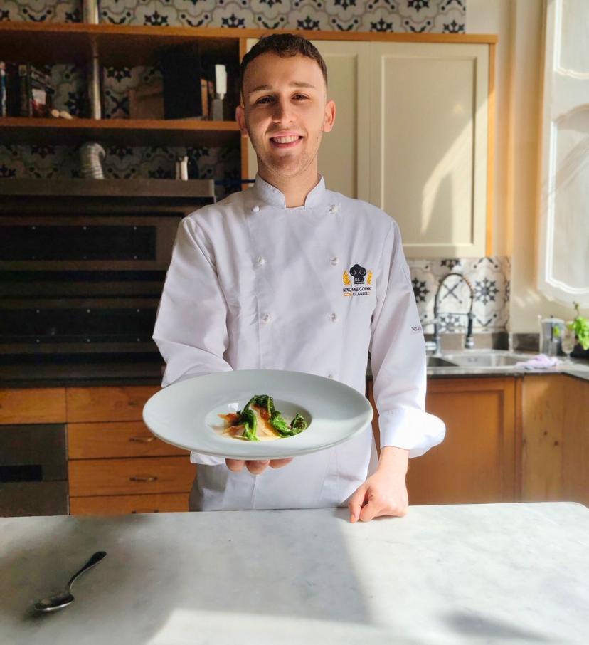 Professional InRome Cooking chef presenting a gourmet dish during a private chef experience in Rome Private Chef in Rome