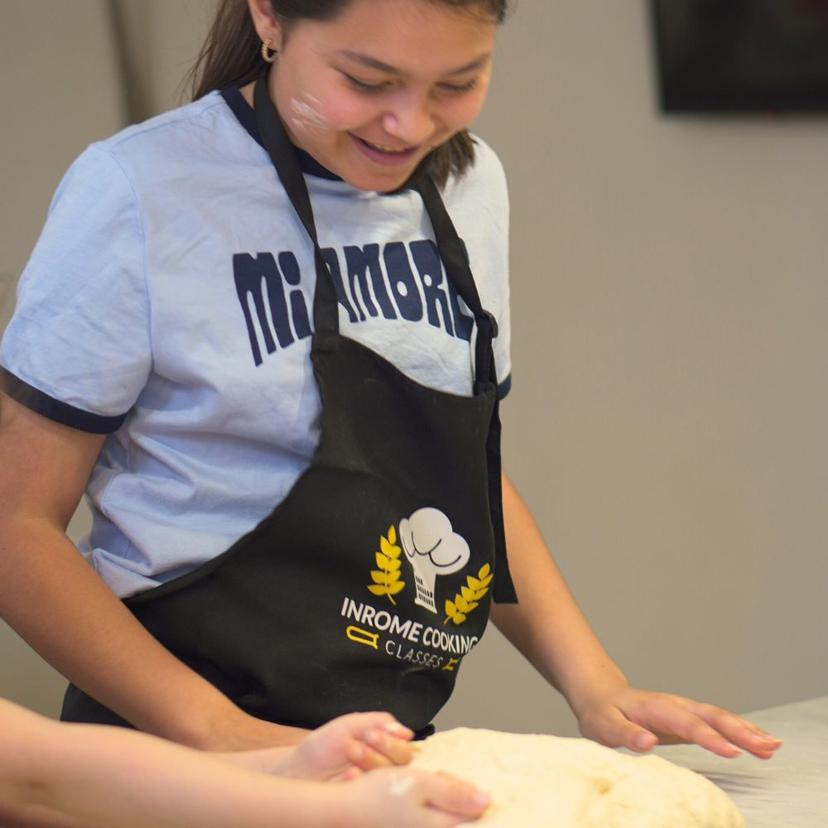 guests-smiling-during-a-hands-on-cooking-experience-in-pizza-making-and-gelato-cooking-class-for-kids Interactive pizza and gelato making class for kids in Rome with an experienced instructor