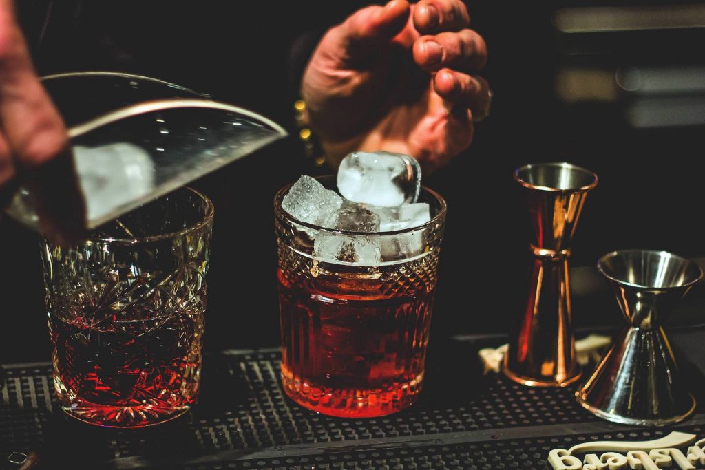 Pouring a Negroni Cocktail